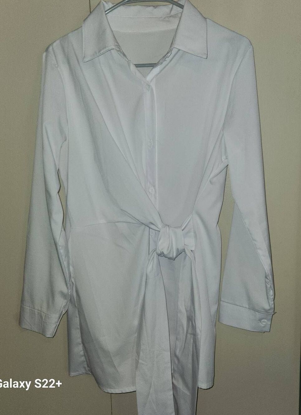 Long white button down blouse with cross over front tie-waist